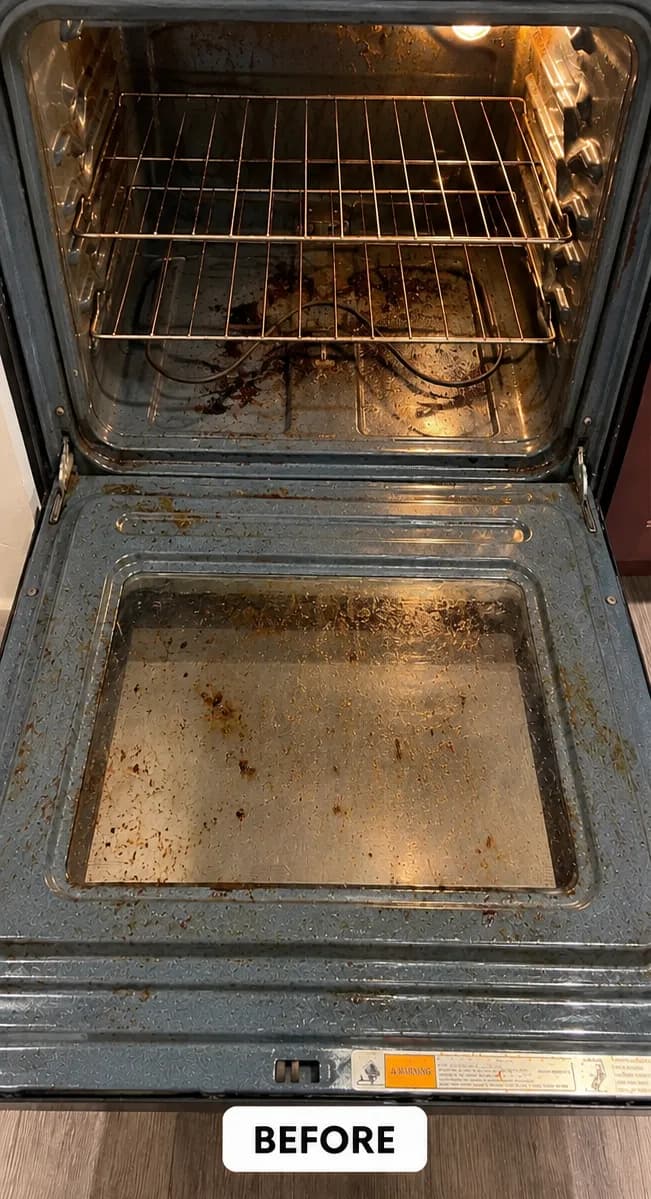 Before cleaning, dirty oven interior with grease stains and crumbs visible on the glass door.